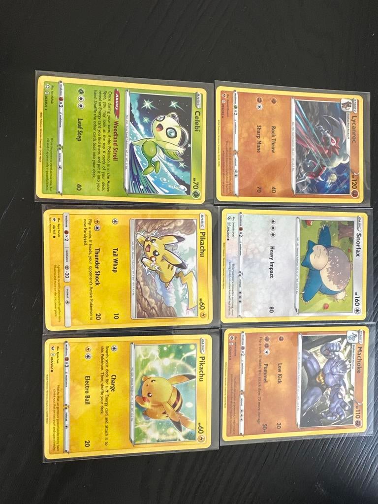 Pokémon kaarten set: Celebi, Lycanroc, Pikachu, Snorlax, Ophalen of Verzenden, Zo goed als nieuw, Meerdere kaarten