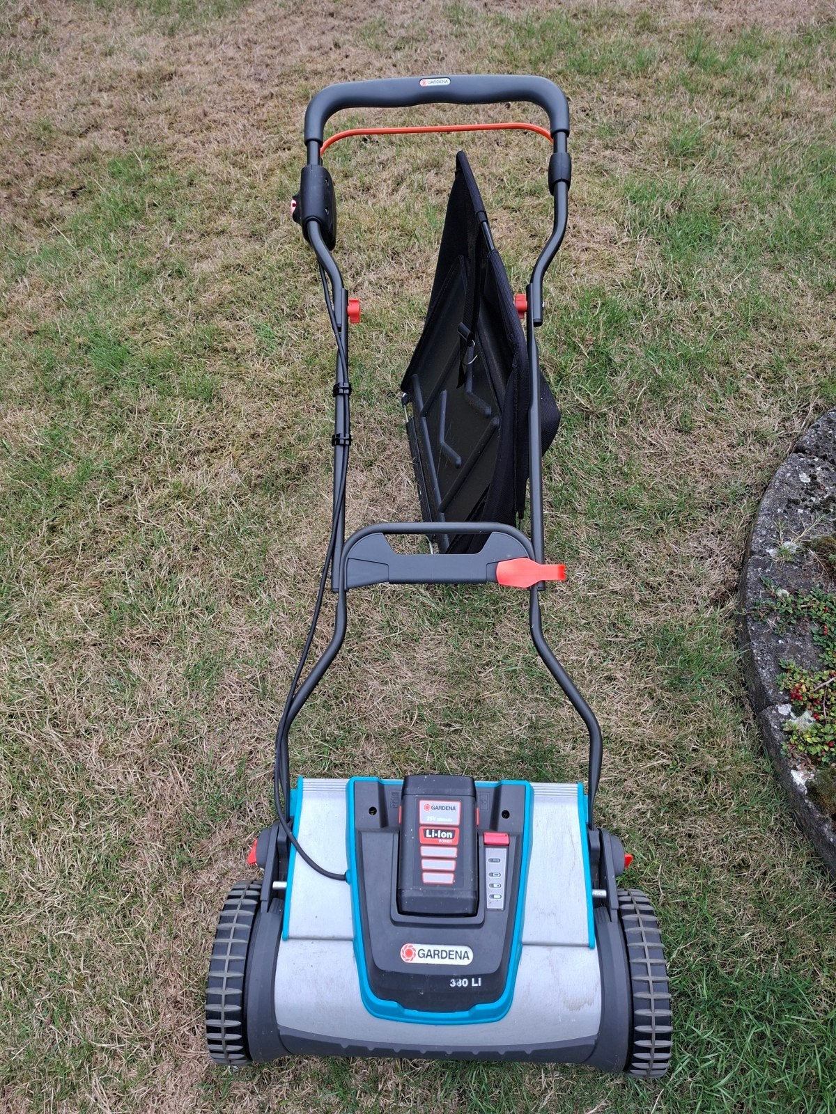 Gardena grasmaaier, Ophalen