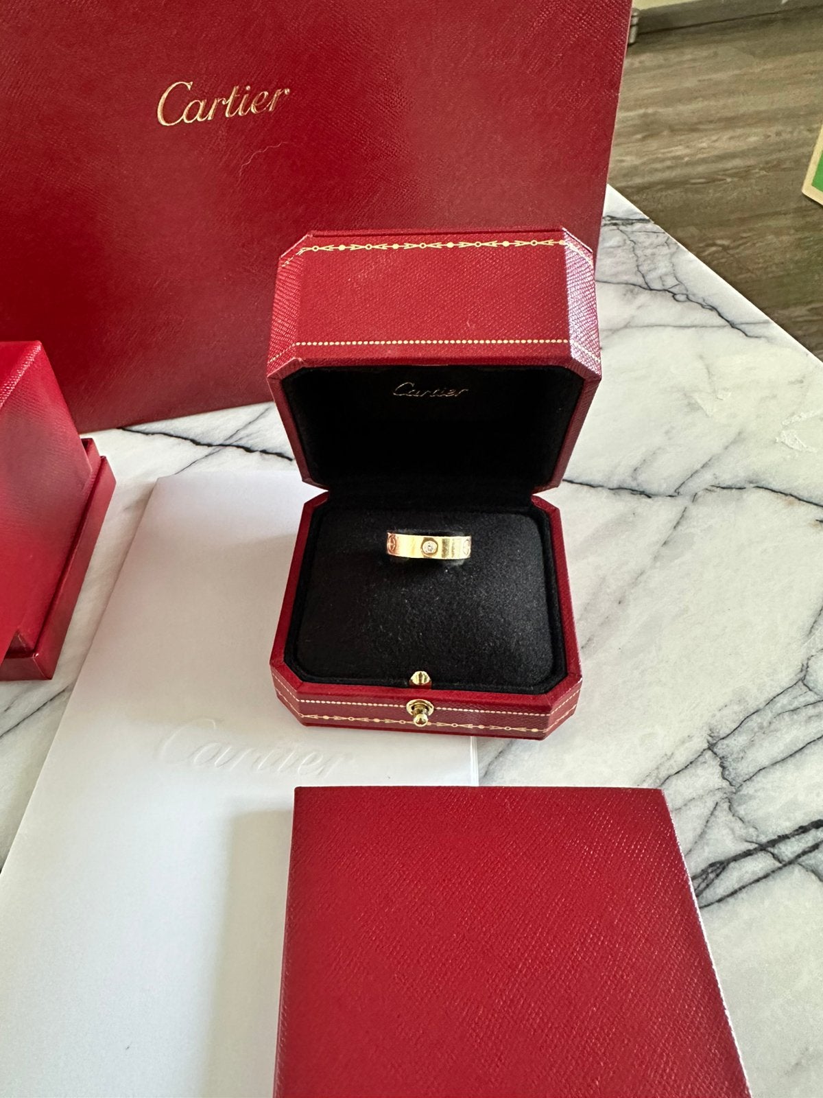Cartier LOVE ring 3 diamanten, Ophalen