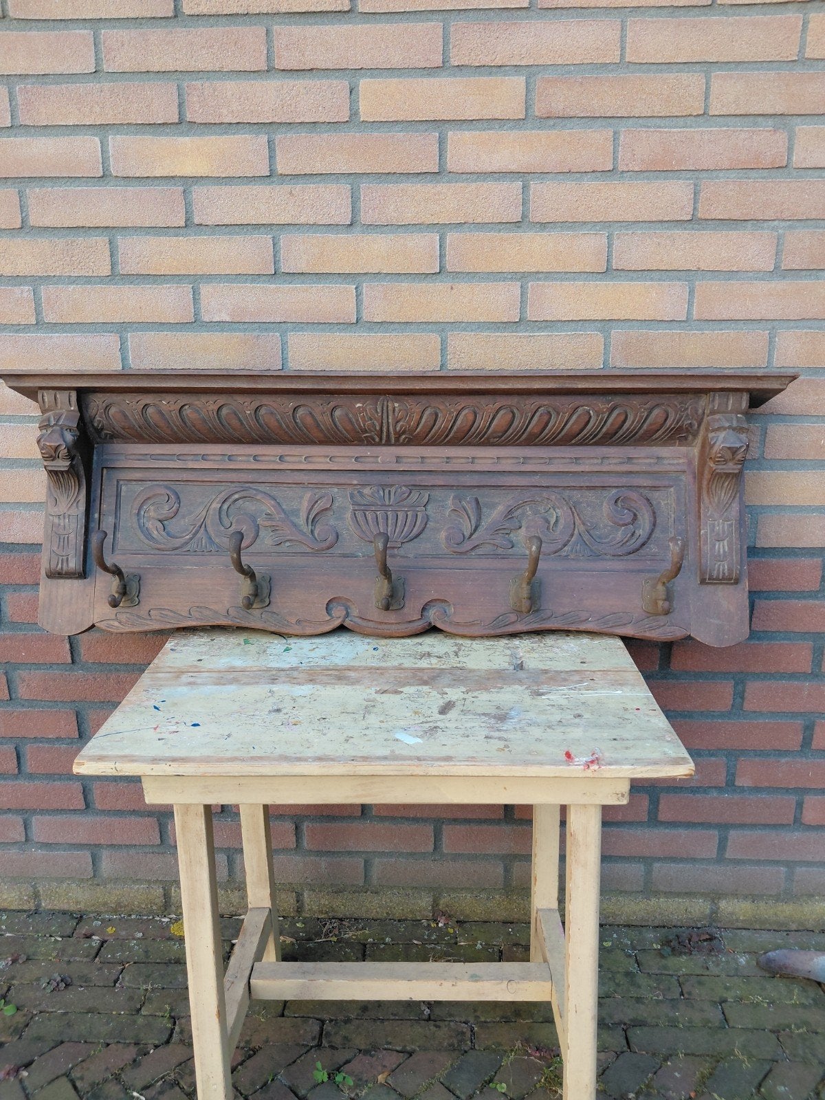 vintage kapstok met houtsnijwerk, Ophalen