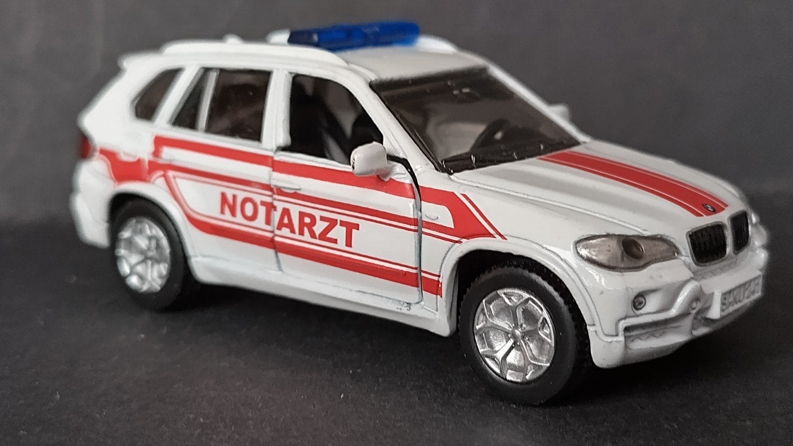 Bmw X5 4.8 Notarzt 1:55 Siku Pol, Hobby en Vrije tijd, Auto, Ophalen of Verzenden, Zo goed als nieuw, Sieper