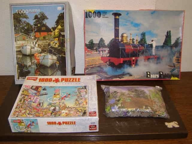 4 puzzels met 1000 stukjes, Ophalen of Verzenden, 500 t/m 1500 stukjes, Gebruikt