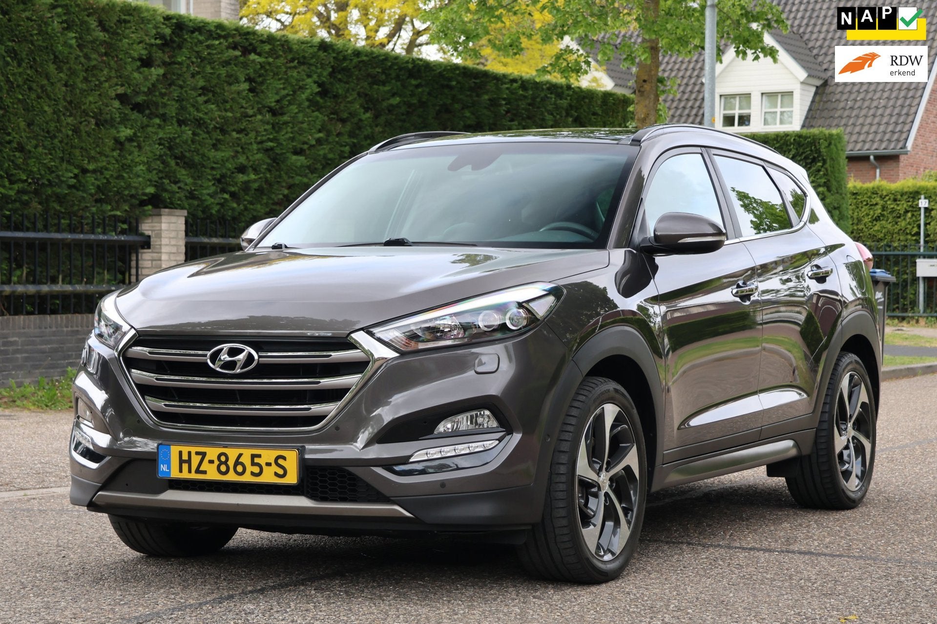 Hyundai Tucson 1.6 T-GDi Premium 4WD | AUTOMAAT | PANO | NAV, Auto's, Dealer onderhouden, Gebruikt, 4 cilinders, Bruin
