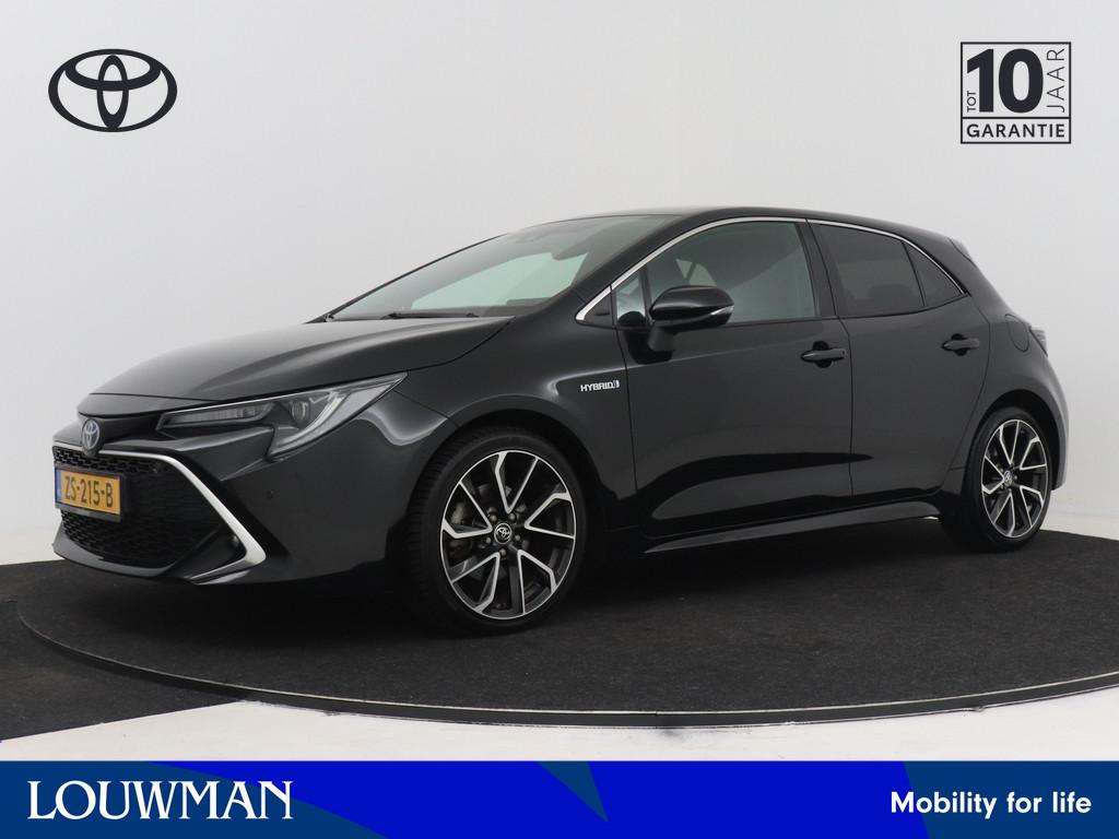 Toyota Corolla 2.0 Hybrid Executive JBL | Sportstoelen | Sto, Auto's, Toyota, 12 maanden, Gebruikt, 4 cilinders, Zwart