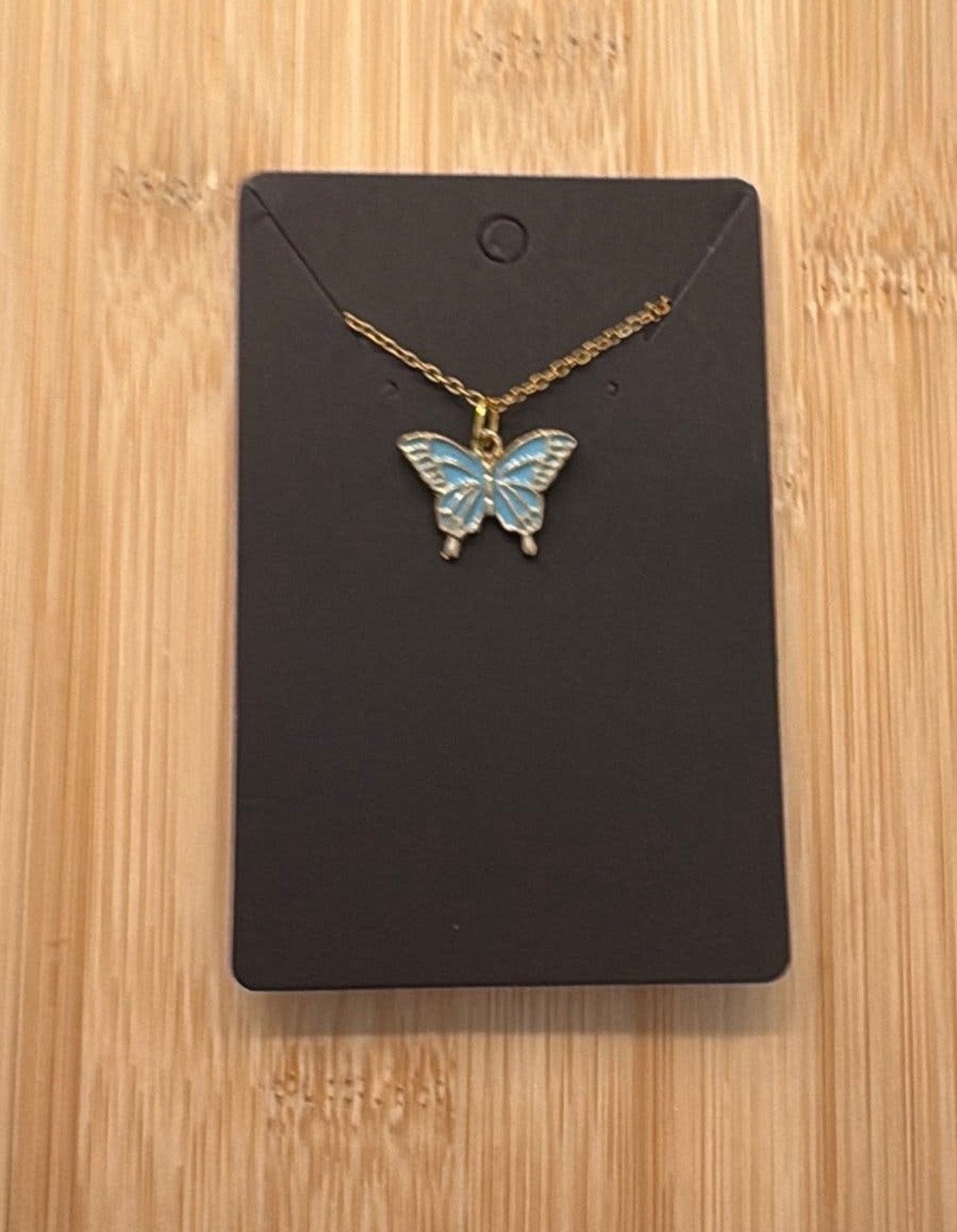 Goudkleurige ketting met vlinder hanger - Nieuw, Verzenden, Nieuw, Goud, Overige materialen