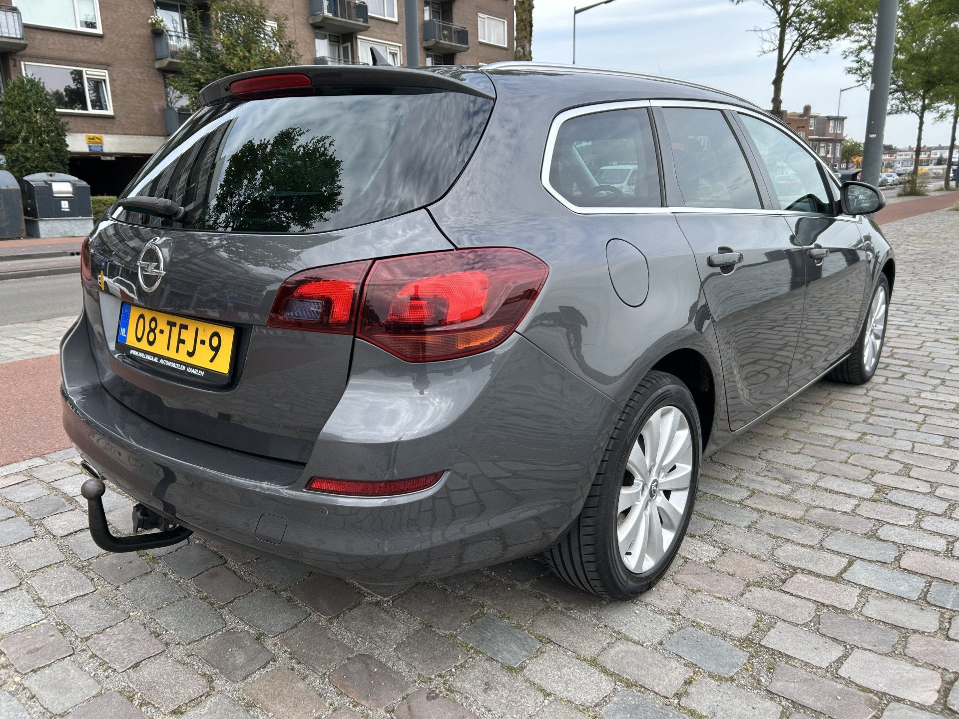 Opel Astra Sports Tourer 1.4 Turbo Cosmo navigatie airco/ecc, Auto's, Voorwielaandrijving, Euro 5, Stof, Gebruikt