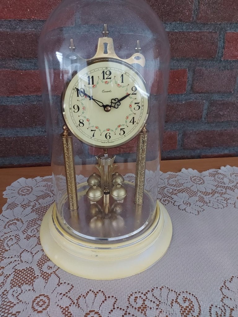 pendule klok, Ophalen