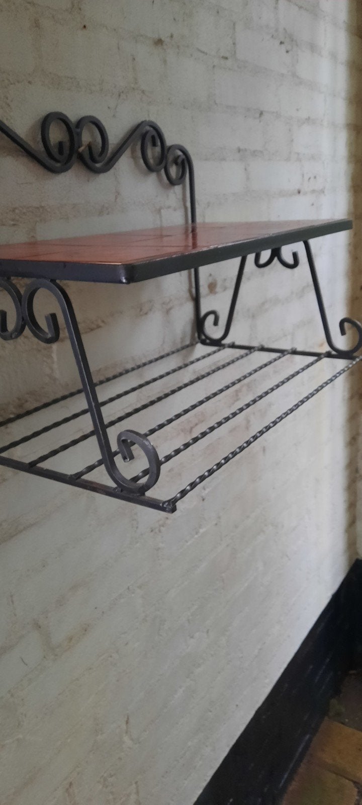 Decoratief wandrek met tegels en smeedijzer, Ophalen of Verzenden