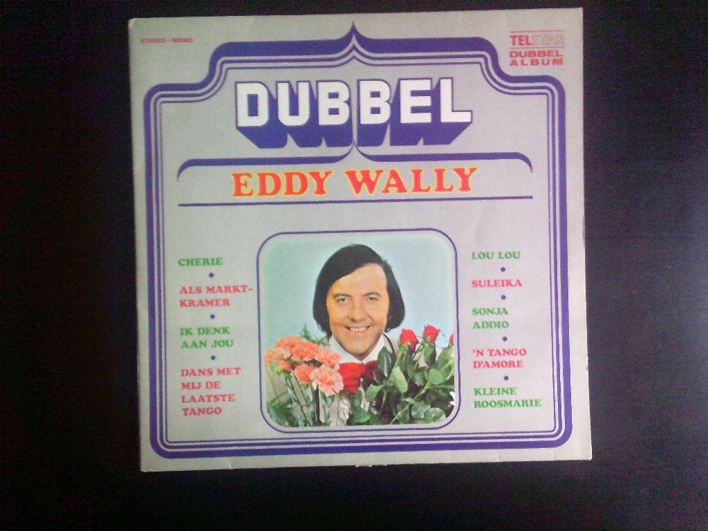 Foto 3 van volle platenkoffer met nederlandse lp,s