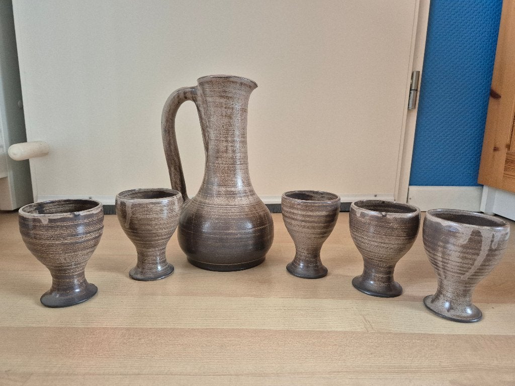 Aardewerk karaf met 5 bekers, Ophalen
