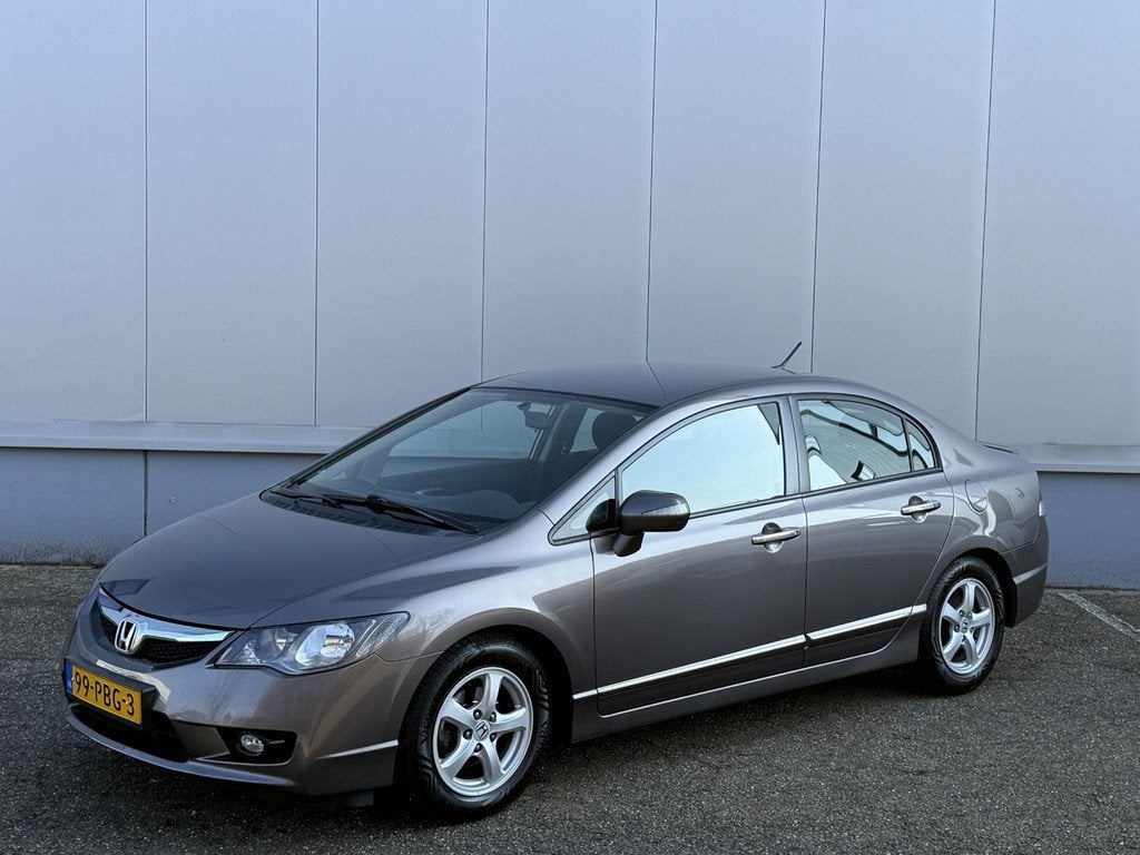 Honda Civic 1.3 Hybrid Elegance Automaat Clima PDC Stoelverw, Auto's, Honda, Stof, Gebruikt, 4 cilinders, Automatische klimaatregeling
