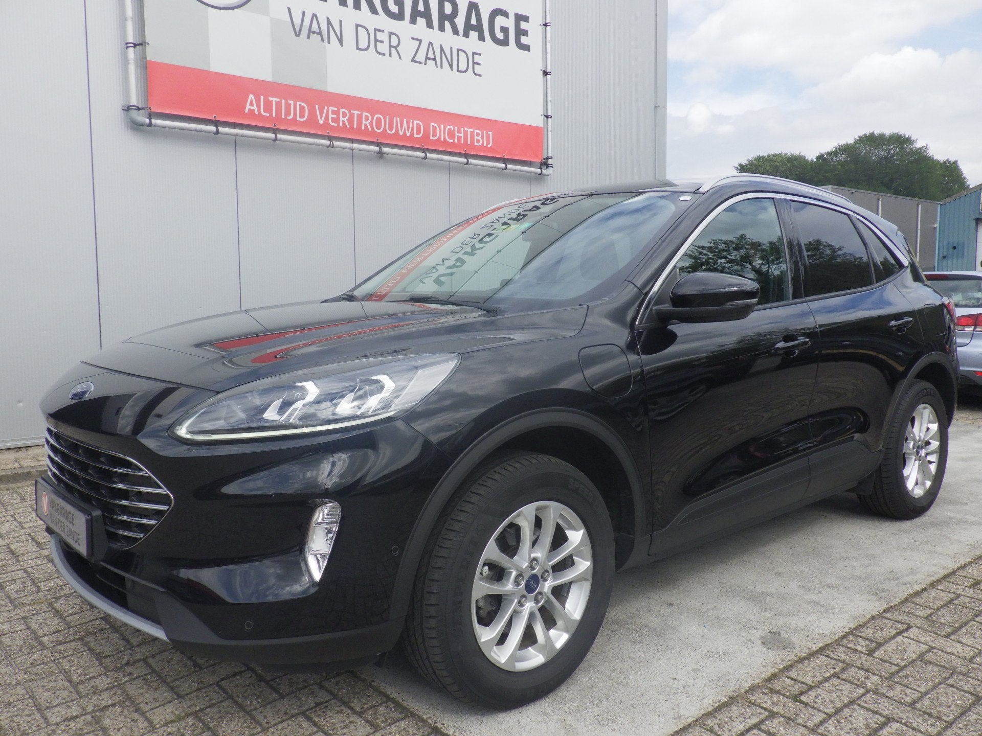 Ford Kuga 2.5 PHEV AUT Plug-In Hybride Titanium, Camera, Cru, Auto's, Ford, Stof, Gebruikt, Zwart, 4 cilinders