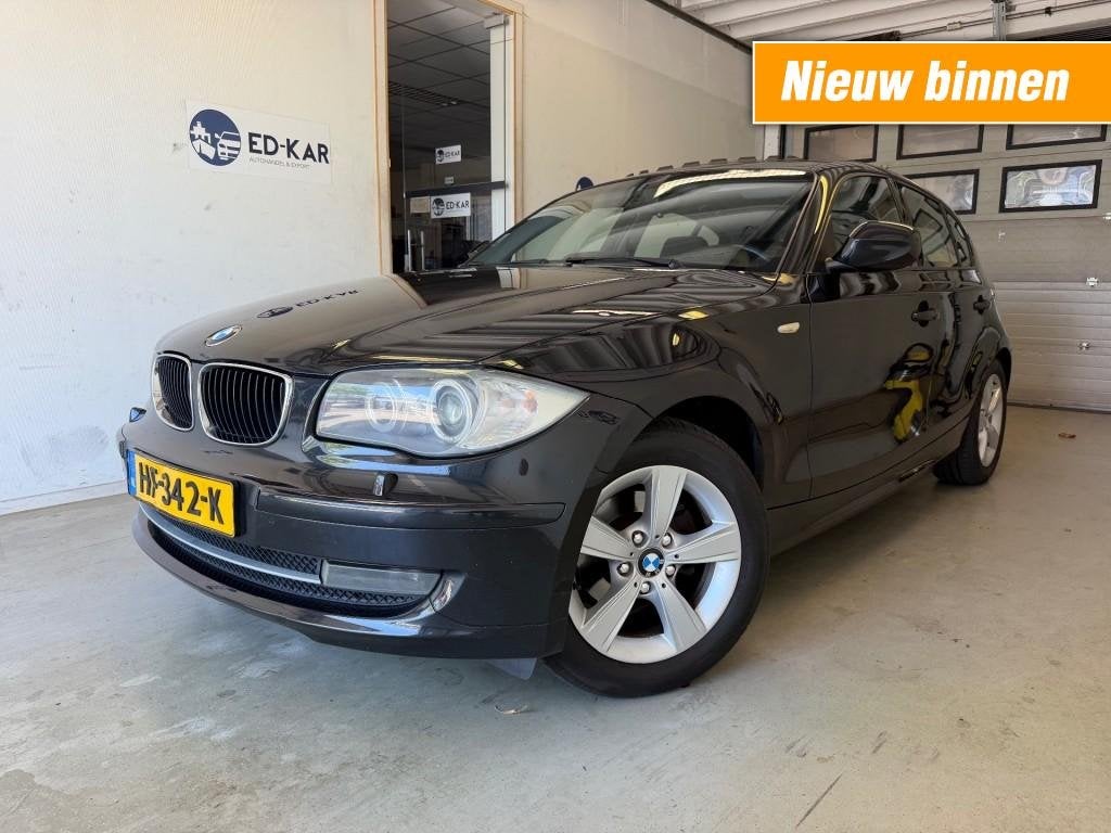 Bmw 1-SERIE 116i Hi Executive NAVI CLIMA XENON PDC SCHUIFDAK, 1-Serie, Euro 5, 4 cilinders, Handgeschakeld