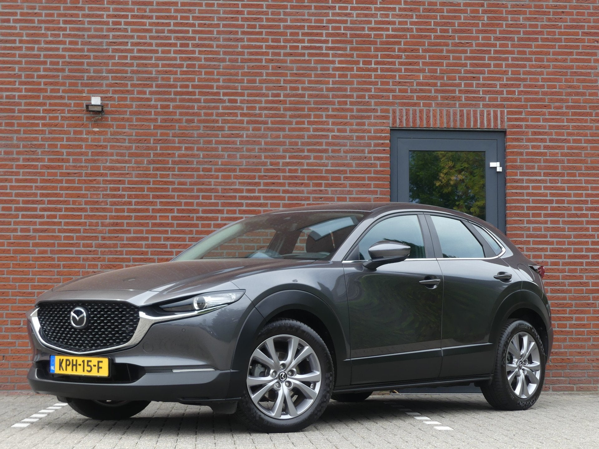 Mazda CX-30 2.0 e-SkyActiv-G M Hybrid Luxury (bj 2021), Auto's, Mazda, Stof, Gebruikt, 4 cilinders, Bedrijf