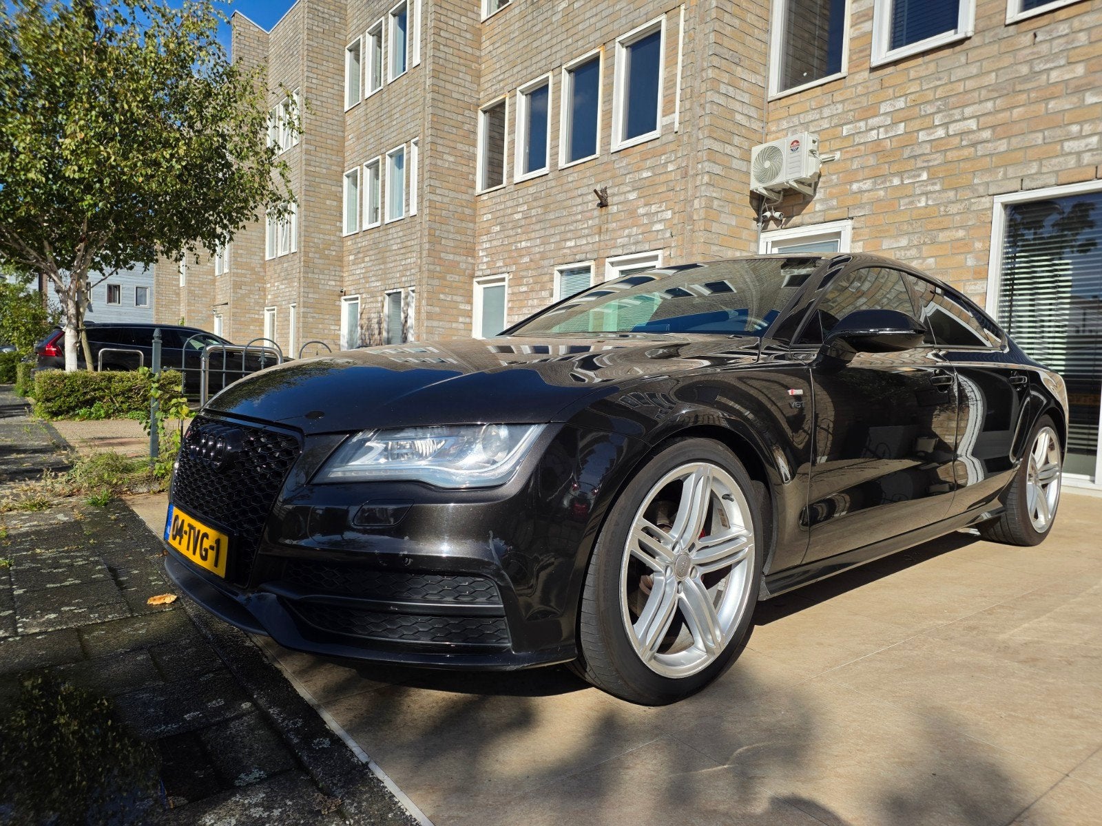 Audi A7 Sportback 2.8 FSI quattro Pro Line Plus ABT uit 2012, Auto's, 2773 cc, Bruin, Bedrijf, Vierwielaandrijving