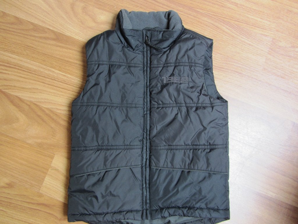 Nieuwe Zwarte Bodywarmer maat 110 NIEUW, Kinderen en Baby's, Kinderkleding | Maat 110, Ophalen of Verzenden, Nieuw, Jongen of Meisje