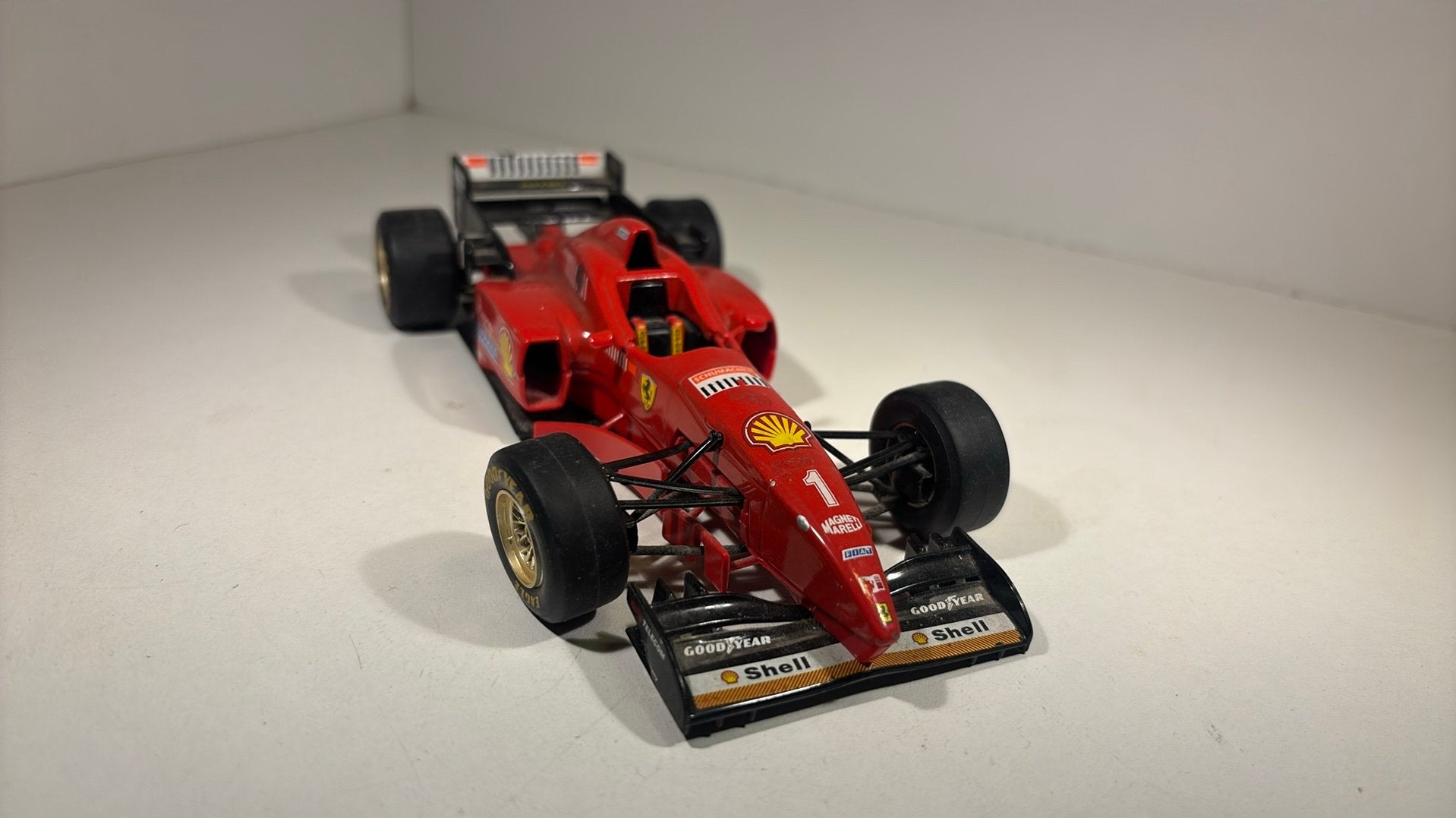 F1 Ferrari f310 m. Schumacher Bburago 1.24, Ophalen of Verzenden, Bburago, A, A
