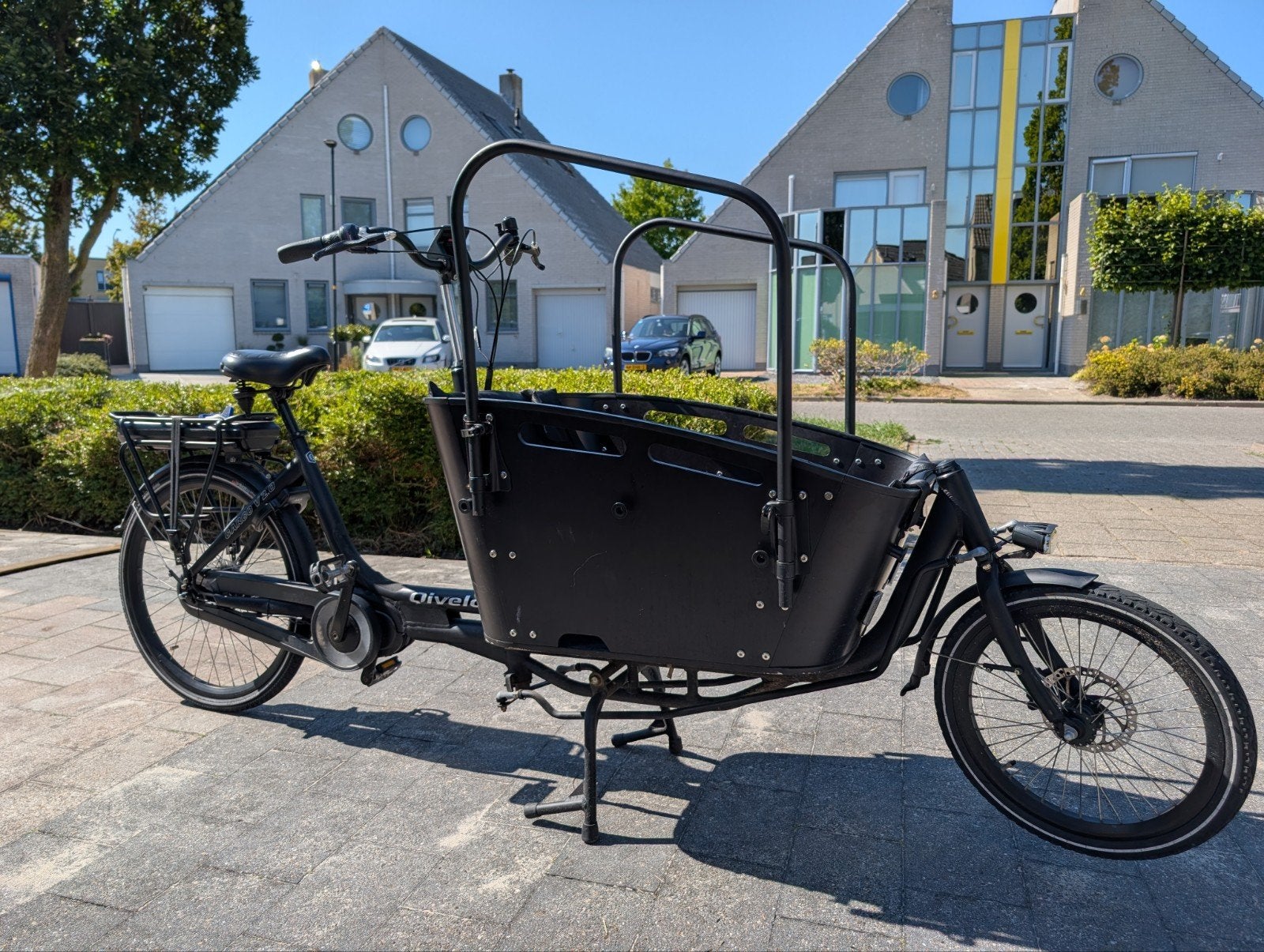 Mooie Vogue Qivelo bakfiets met E25 storing, 4 kinderen of meer, Gebruikt, Huif, Ophalen