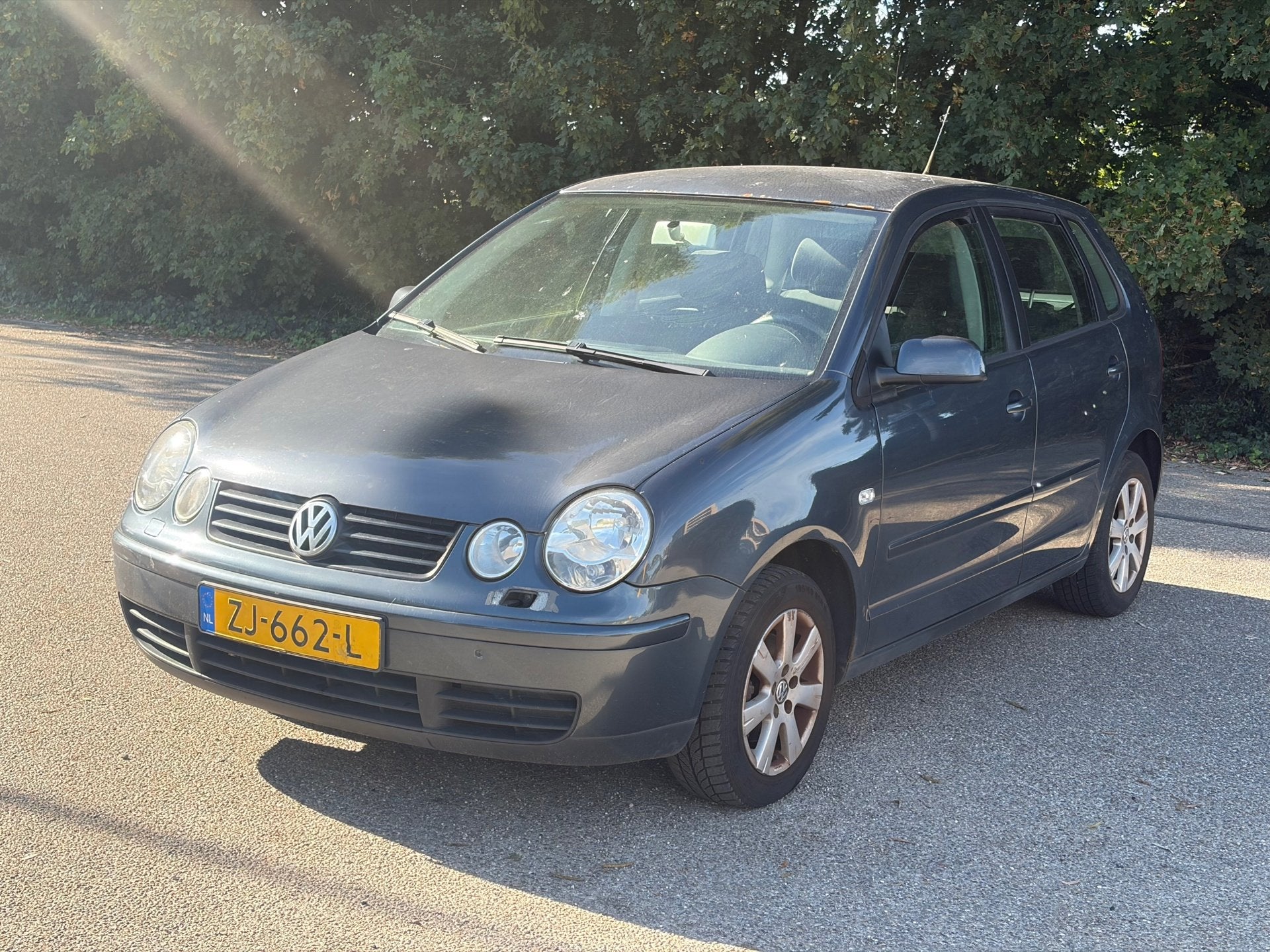 Volkswagen Polo 1.4-16V Airco! Stoelverwarming! 5-Deurs!, Auto's, Voorwielaandrijving, Stof, Zwart, 4 cilinders