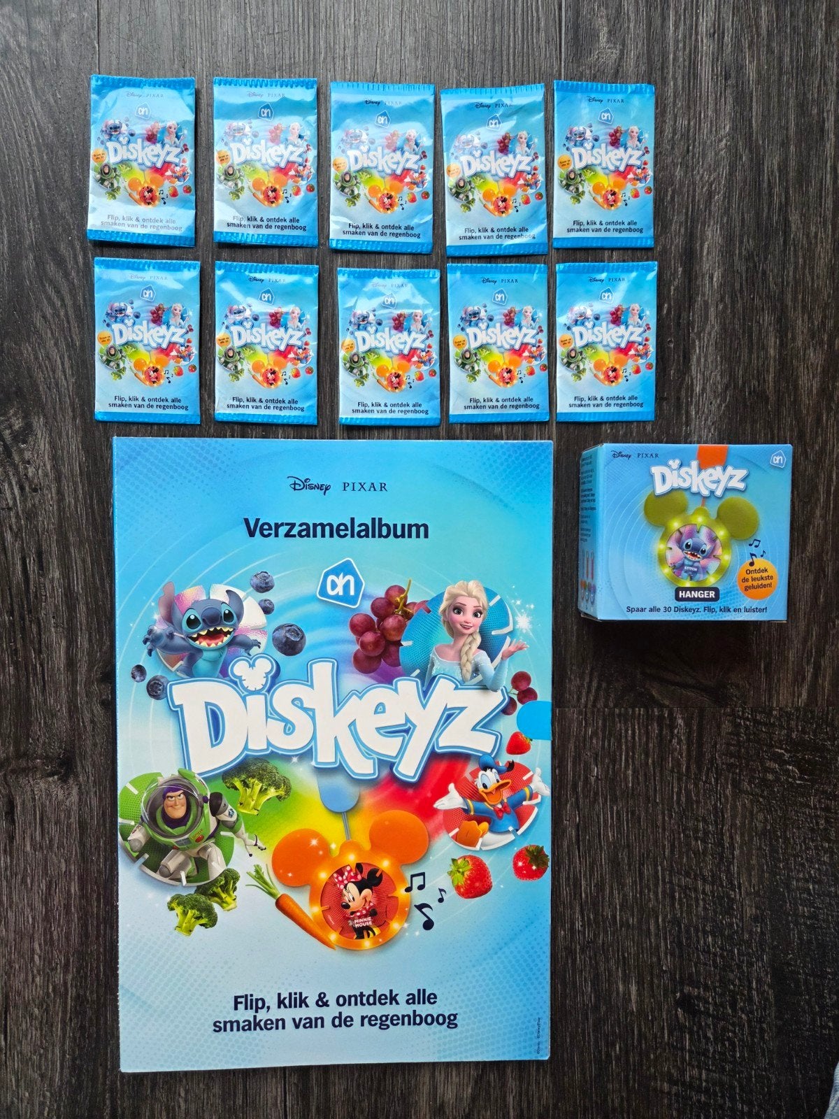 Leeg album diskeyz + hanger + 10 dichte zakjes Disney AH, Albert Heijn, Ophalen of Verzenden