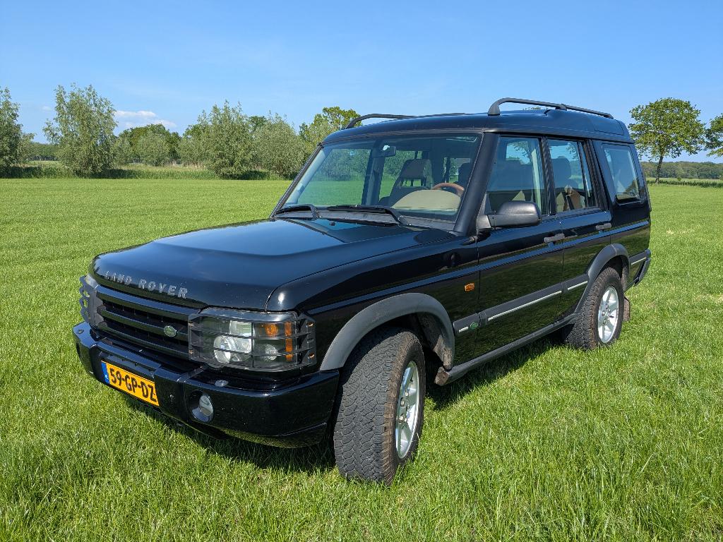 Land Rover Discovery 2.5 TD5 Series II AUT 2001 Zwart, Auto's, Land Rover, Automaat, Zwart, Bruin, Vierwielaandrijving