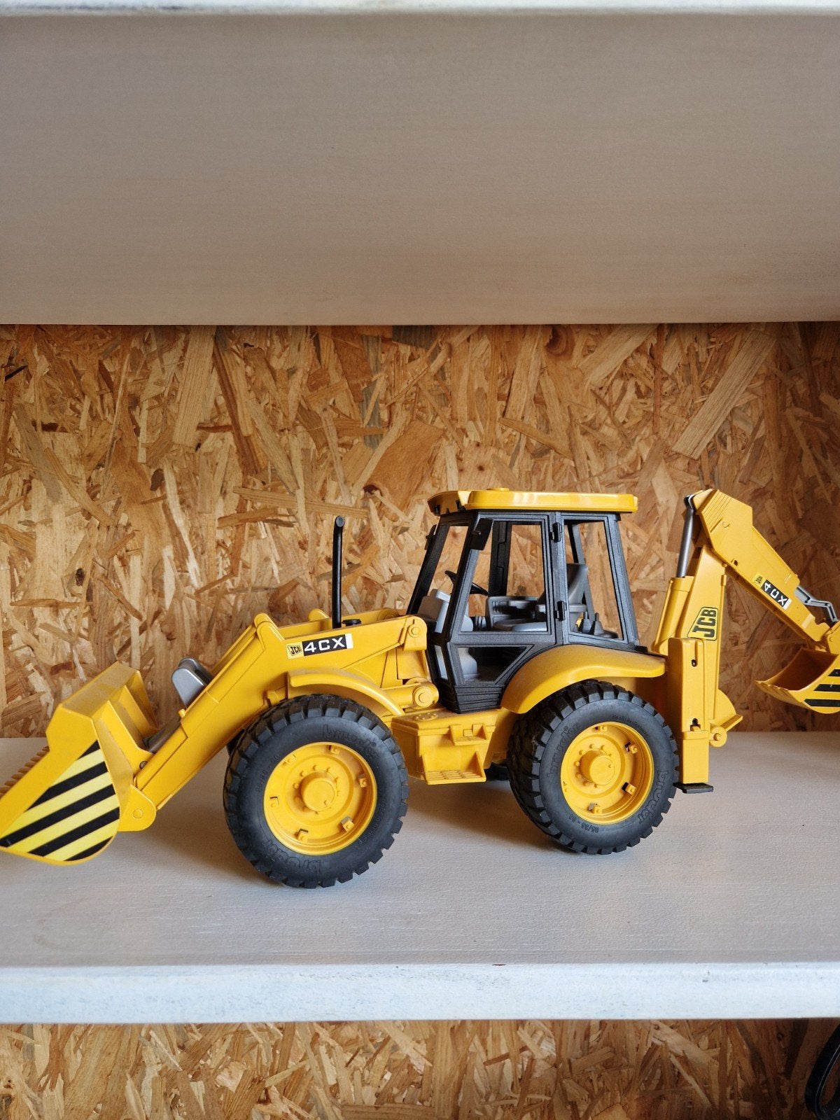 JCB 4CX Speelgoed Graafmachine - Geel, Ophalen of Verzenden, Zo goed als nieuw