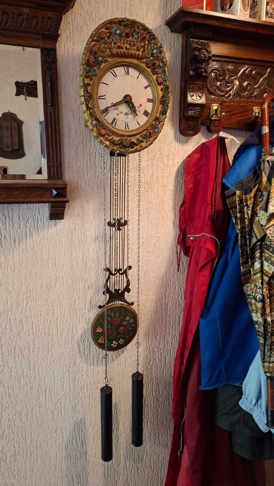 Traditionele antieke wandklok, Ophalen