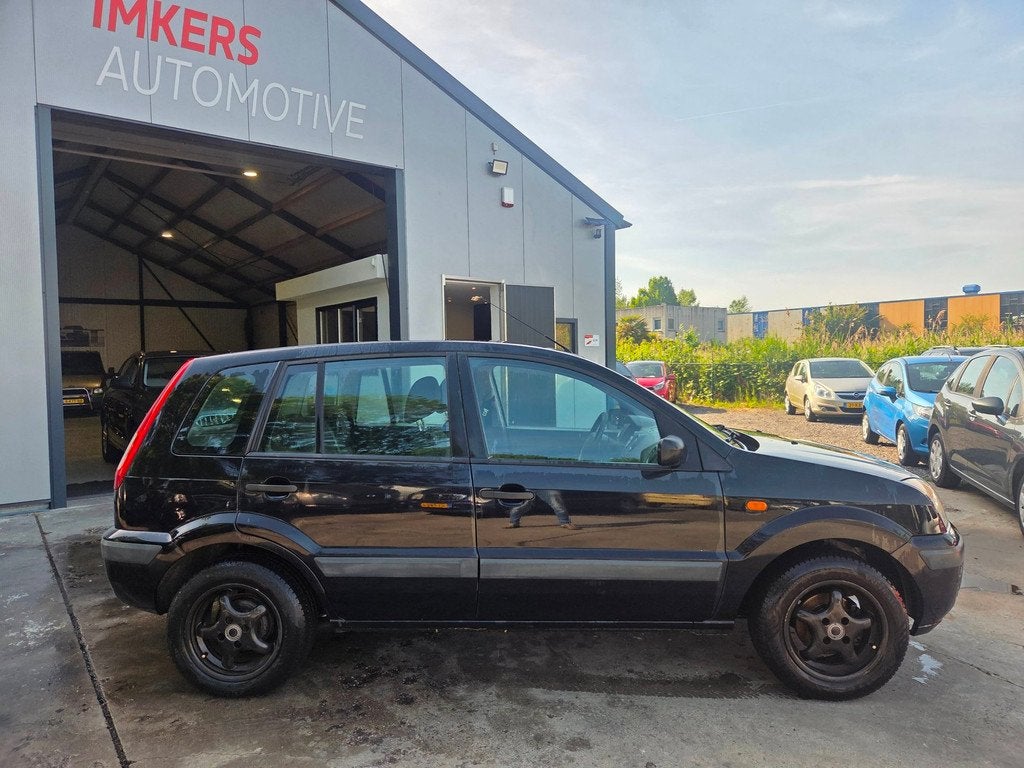 Ford Fusion 1.4-16V Champion | Airco | NIEUWE APK, Auto's, Ford, Voorwielaandrijving, Gebruikt, Zwart, Origineel Nederlands