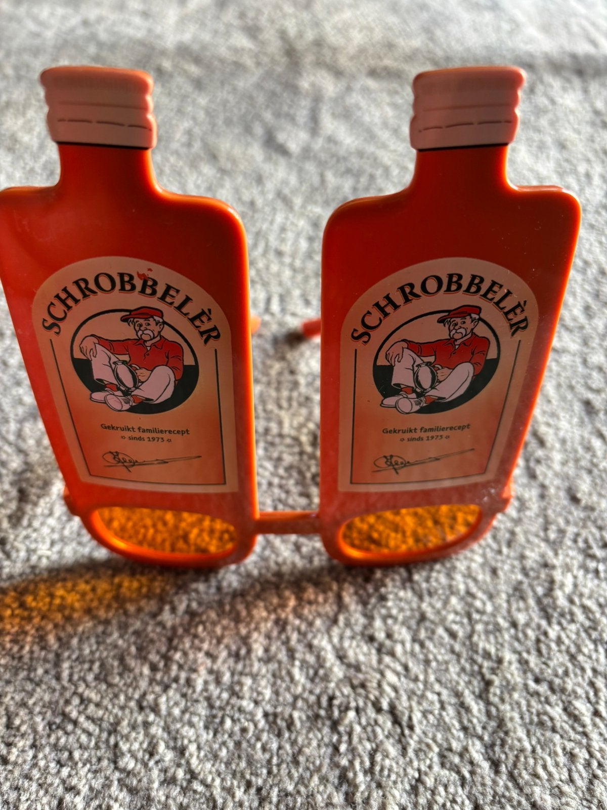 Schrobbelèr oranje zonnebril (nieuw!), Ophalen of Verzenden, Nieuw, Gebruiksvoorwerp