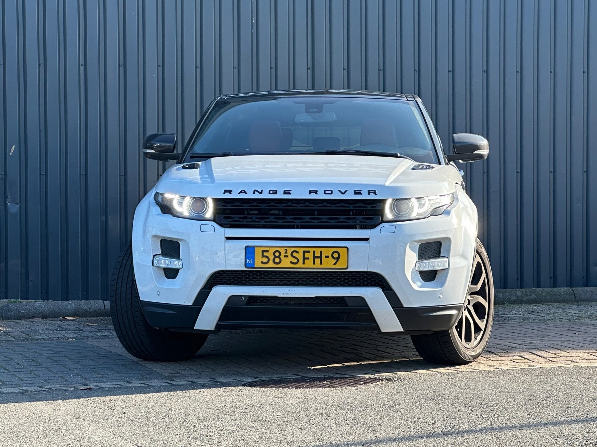 Land Rover Range Rover Evoque Coupé 2.0 Si 4WD Prestige PAN, Auto's, Land Rover, Automaat, Euro 5, 4 cilinders, 4 stoelen