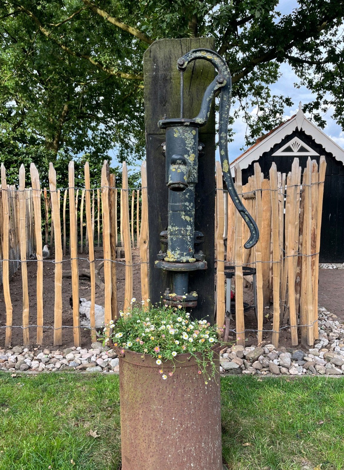 Gietijzeren zwengel waterpomp, Ophalen, Gebruikt