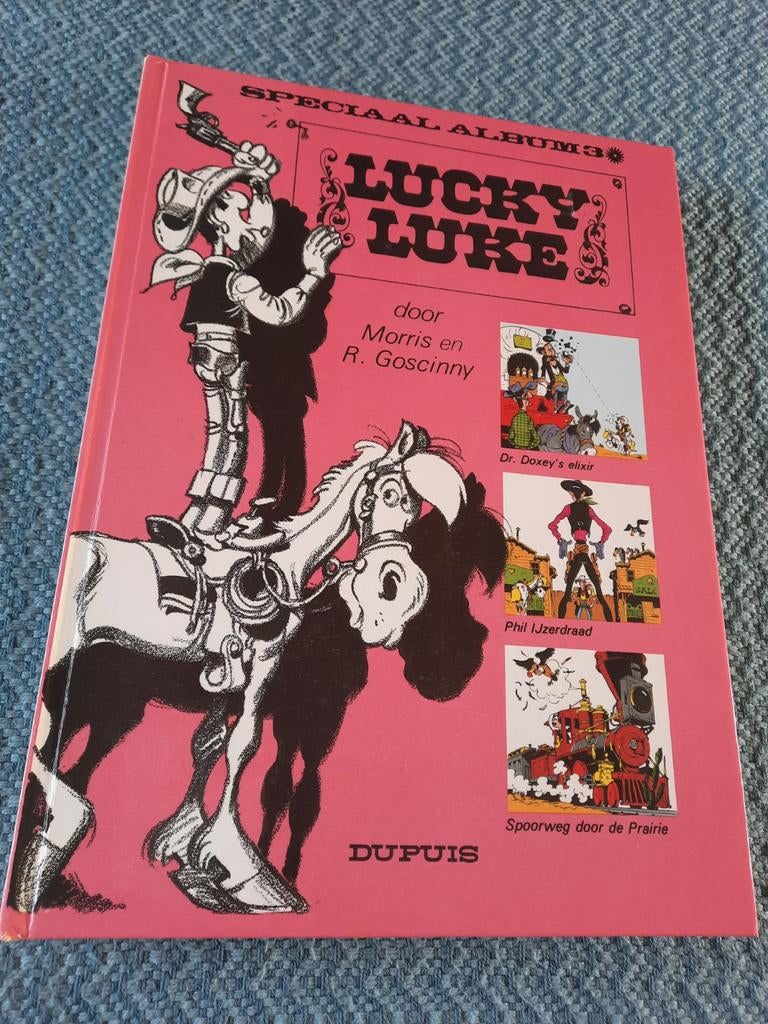 Lucky Luke Speciaal Album 3 - Dr. Doxey's Elixir, Boeken, Stripboeken, Eén stripboek, Ophalen of Verzenden, Gelezen, Morris en René Goscinny