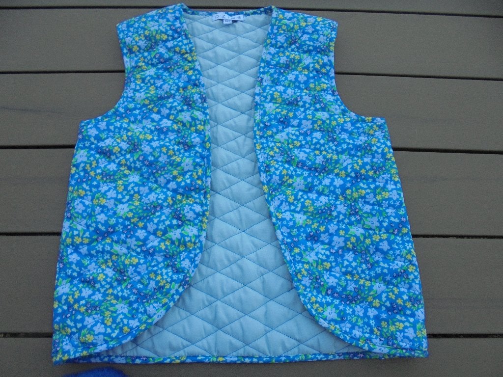 Blauw/gele bodywarmer, Meisje, D-Zine, Ophalen of Verzenden, Zo goed als nieuw