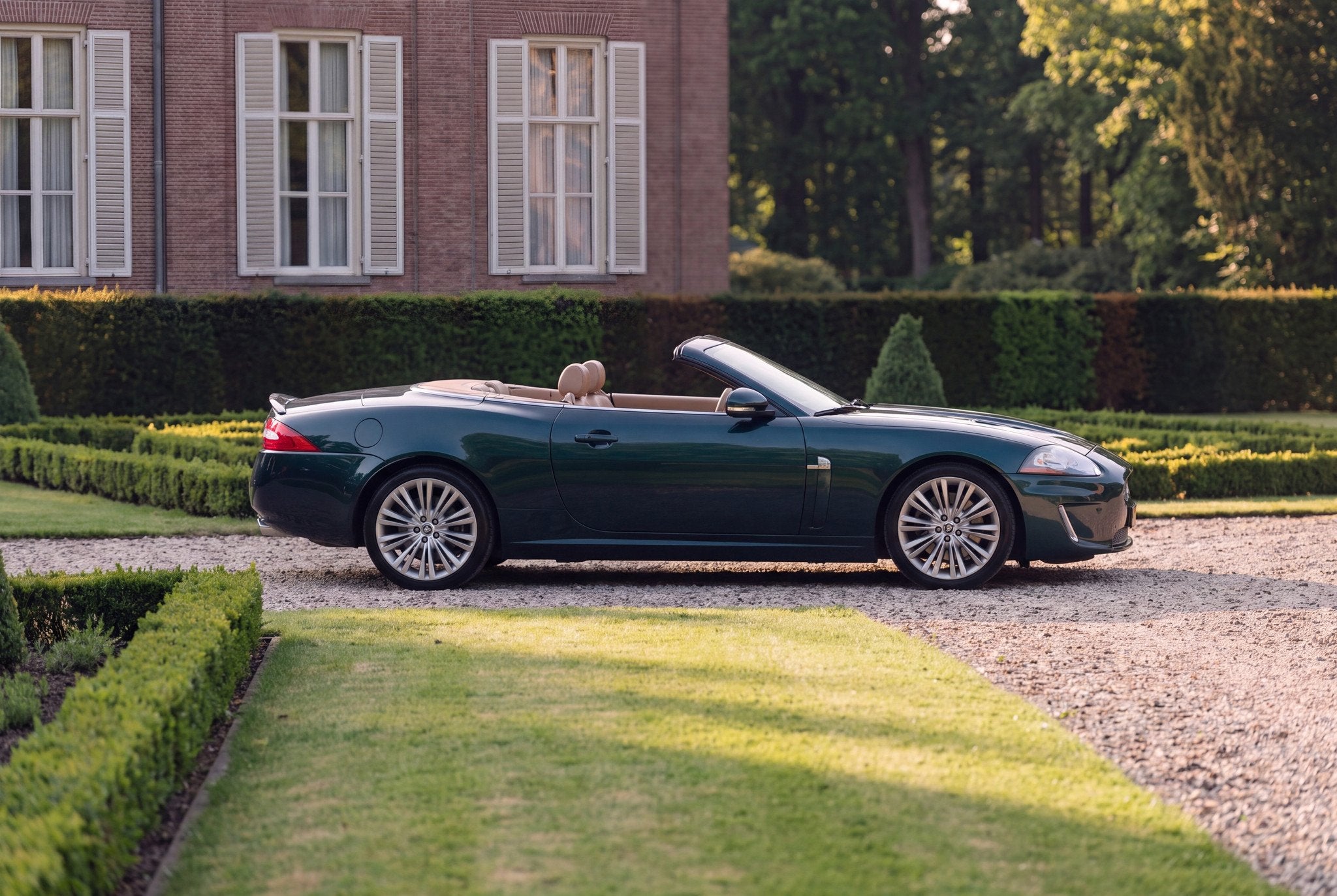 Jaguar XK 5.0 Convertible (bj 2009, automaat), Auto's, Gebruikt, Overige kleuren, Cabriolet, Leder