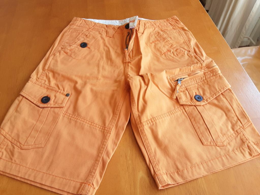 Oranje korte broek maat XS merk Cult edition, Ophalen of Verzenden, Zo goed als nieuw, Jongen, Broek