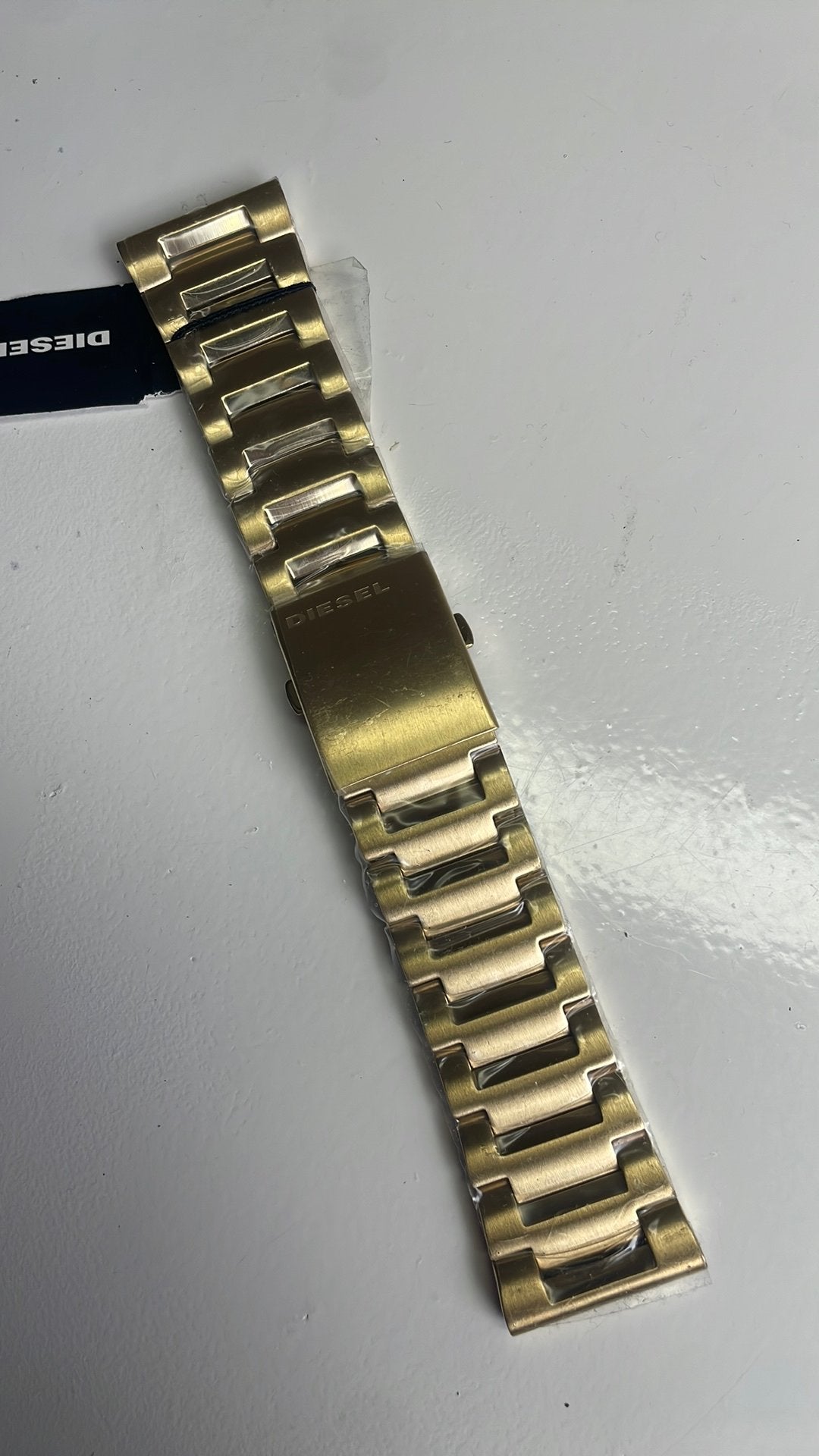 Diesel horlogeband goudkleur staal, Sieraden, Tassen en Uiterlijk, Overige Accessoires, Ophalen of Verzenden, Nieuw