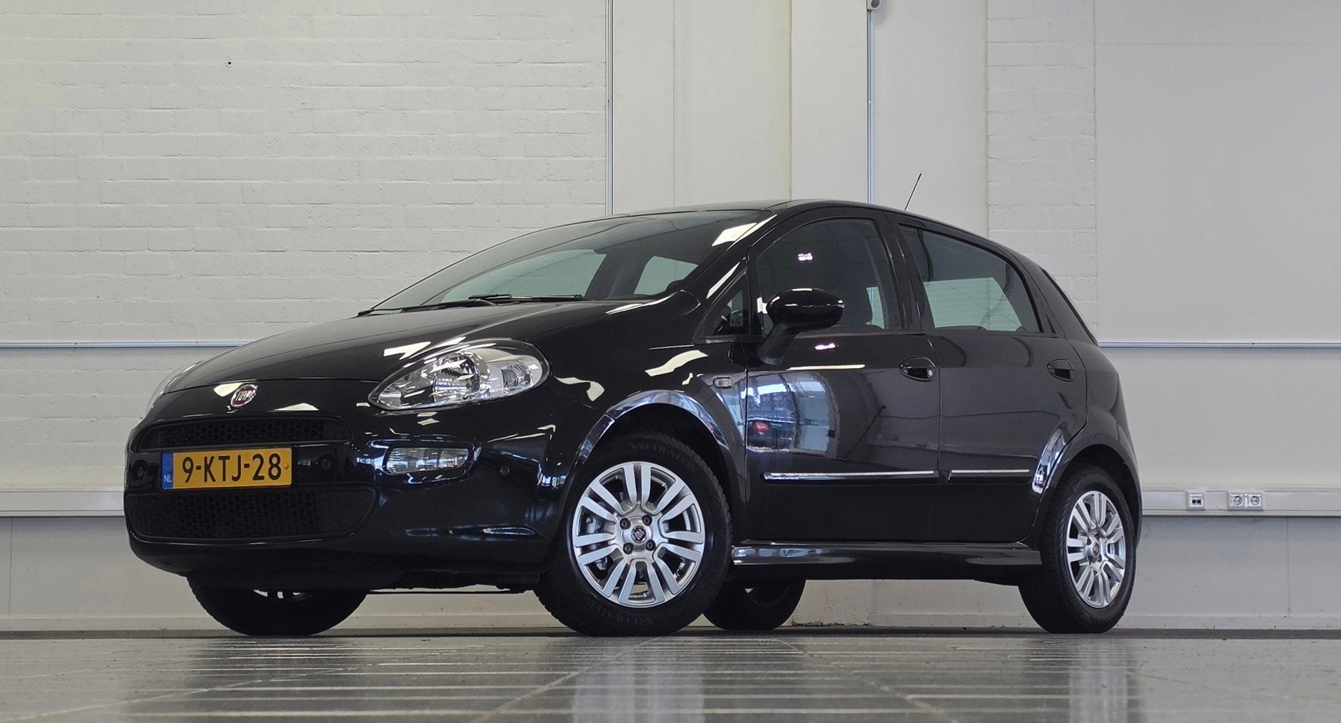Fiat Punto Evo 1.4 Edizione Cool Automaat 2e Eigenaar Parkee, Auto's, Euro 5, Stof, Zwart, 4 cilinders