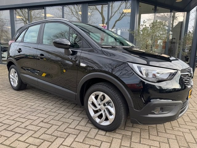 Opel Crossland X 1.2 Turbo Edition Airco | Trekhaak |, Auto's, Gebruikt, Euro 6, 1199 cc, Zwart