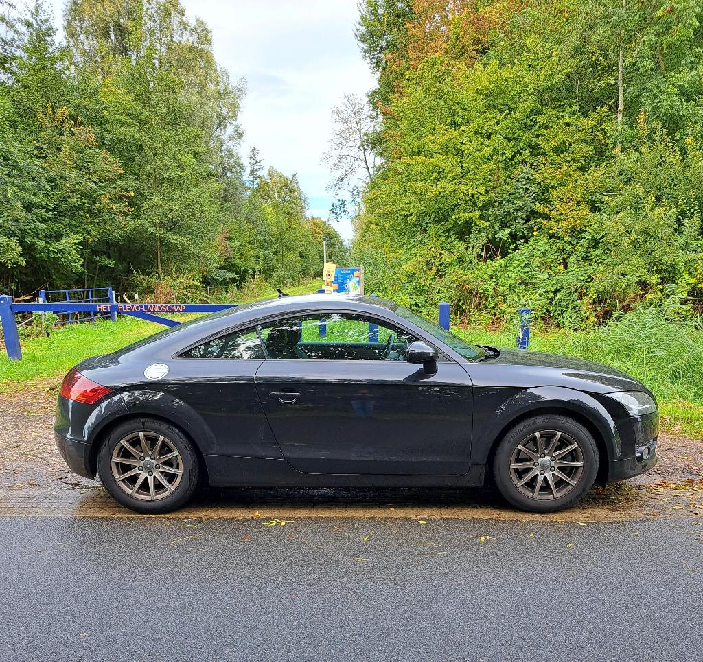 Audi TT 1.8 Coupe 118KW 2009 Zwart, Auto's, Voorwielaandrijving, Zwart, 4 cilinders, Zwart