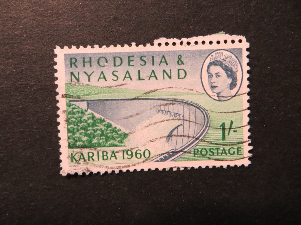 A00336: Rhodesia & Nyasaland QEII 1/-, Postzegels en Munten, Postzegels | Afrika, Ophalen of Verzenden, Tanzania
