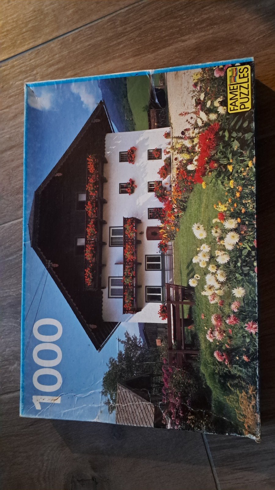 Fame Puzzles Legpuzzel 1000 stukjes - Huis met bloemen, Ophalen of Verzenden, 500 t/m 1500 stukjes, Gebruikt