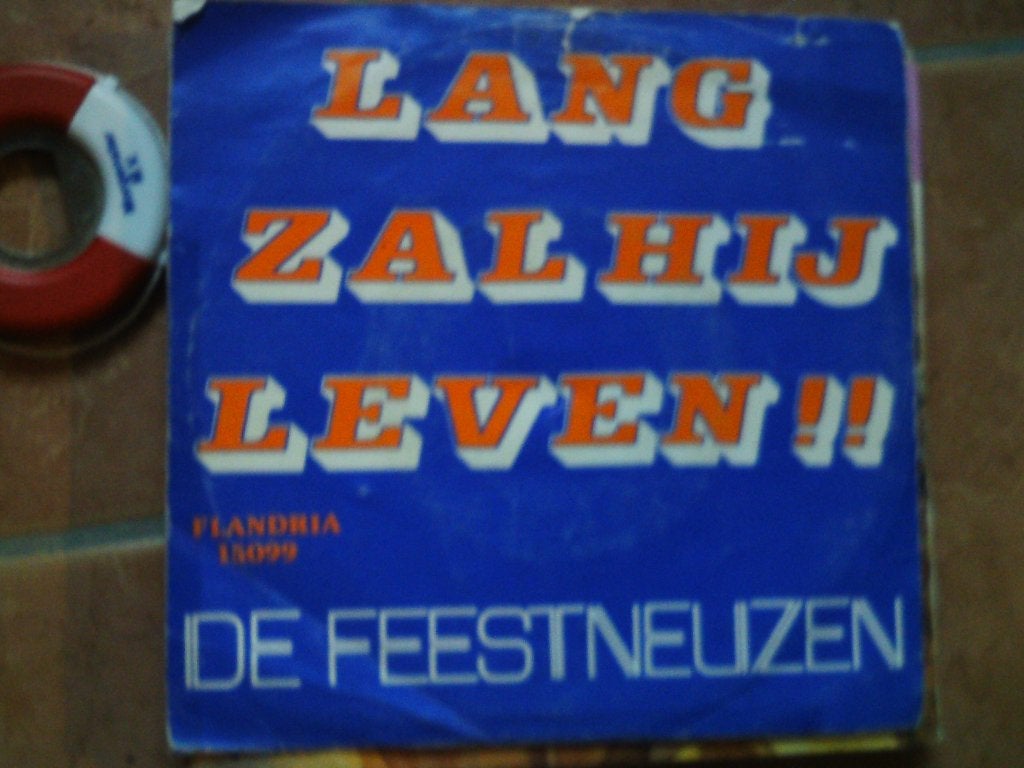 De Feestneuzen - Lang Zal Hij Leven! / lang zal ze leven 15s, 7 inch, Ophalen of Verzenden, Zo goed als nieuw, Beschermende buitenhoes
