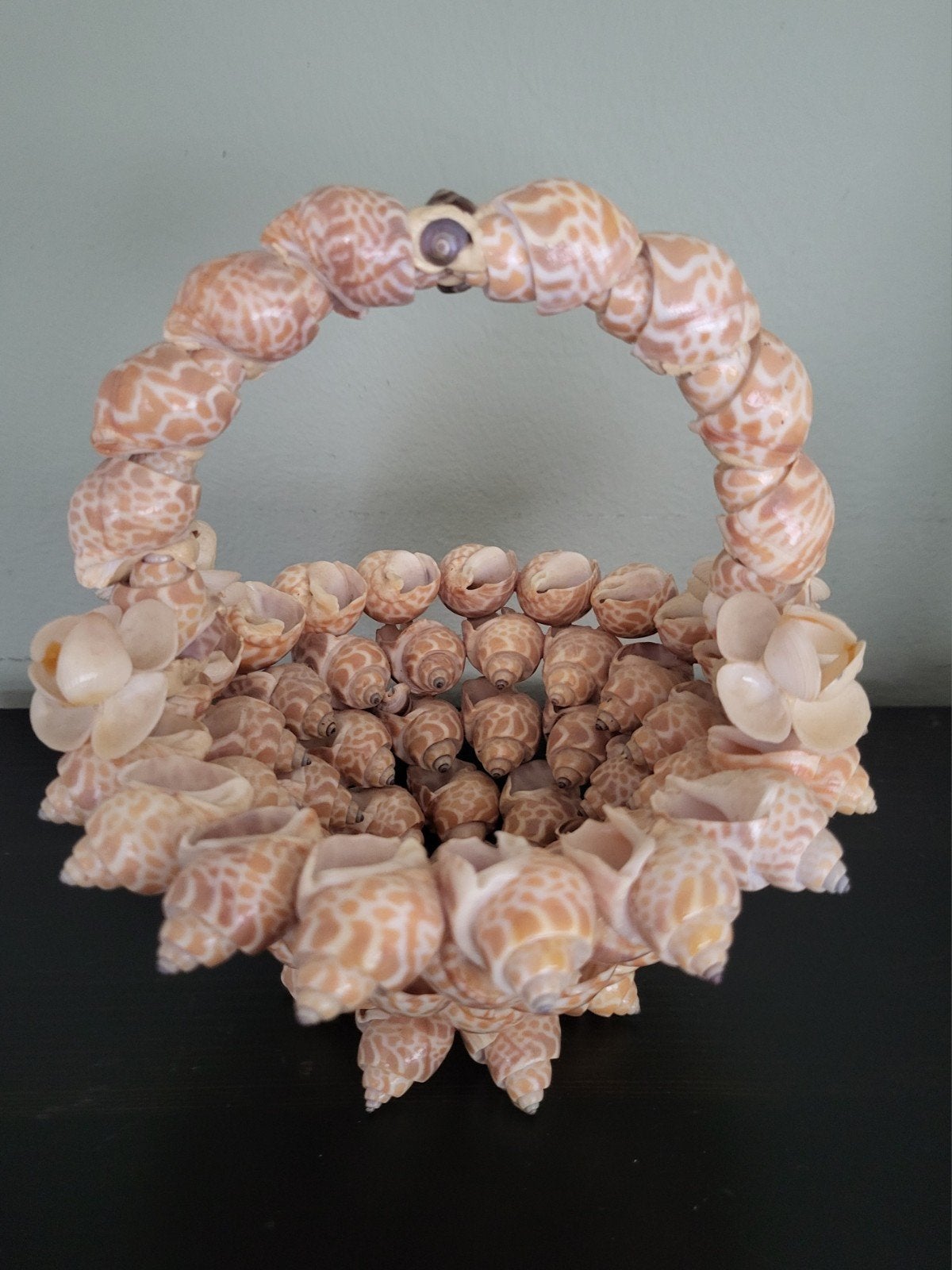 Schelpen mand, Ophalen