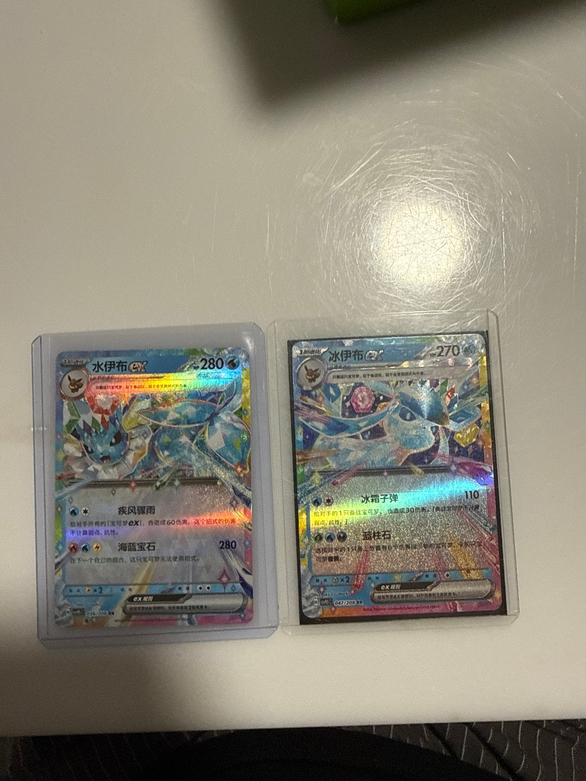 Pokémon Kaarten: Vaporeon EX en Glaceon EX (Chinees), Hobby en Vrije tijd, Ophalen of Verzenden, Zo goed als nieuw, Meerdere kaarten