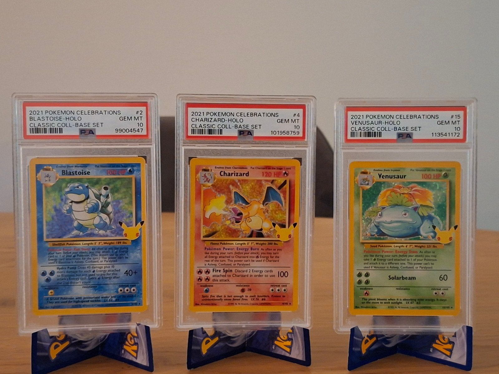 Pokémon Celebrations PSA 10 Charizard Blastoise Venusaur Set, Ophalen of Verzenden, Nieuw, Meerdere kaarten, Foil