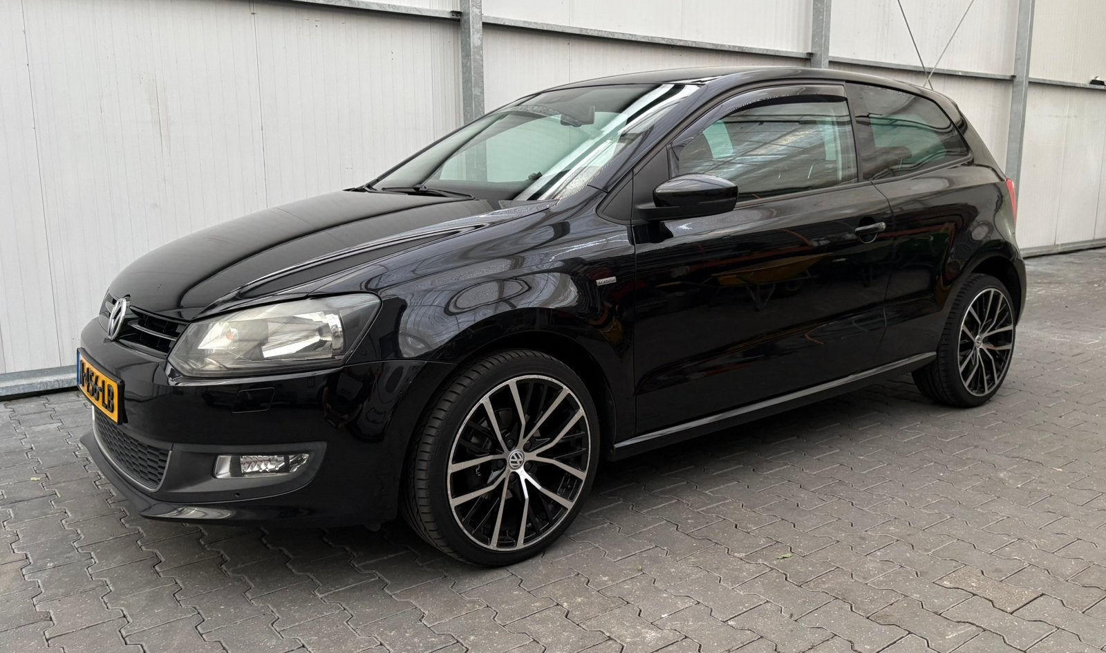 Volkswagen Polo Match 1.2 TSI 66KW 2012 Zwart, Auto's, Voorwielaandrijving, 40 €/maand, Zwart, 4 cilinders
