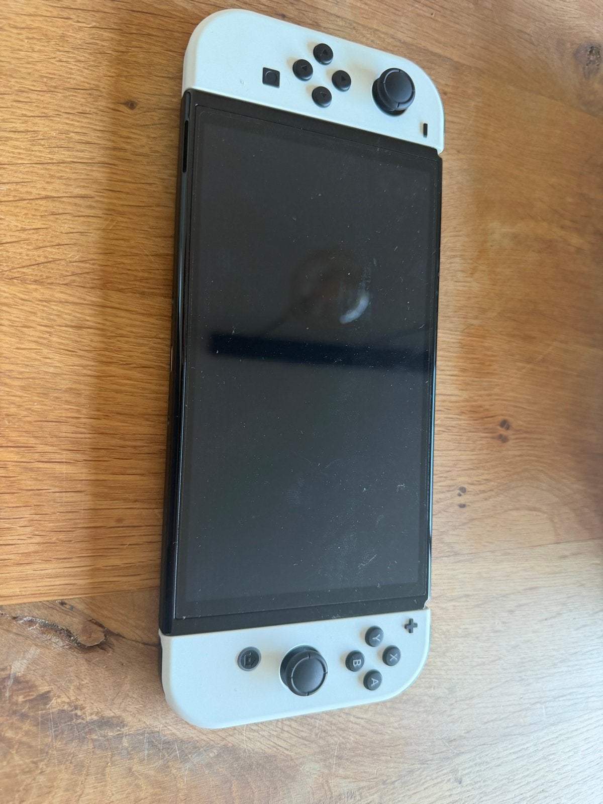 Foto 4 van Nintendo Switch OLED met 3 games en originele doos