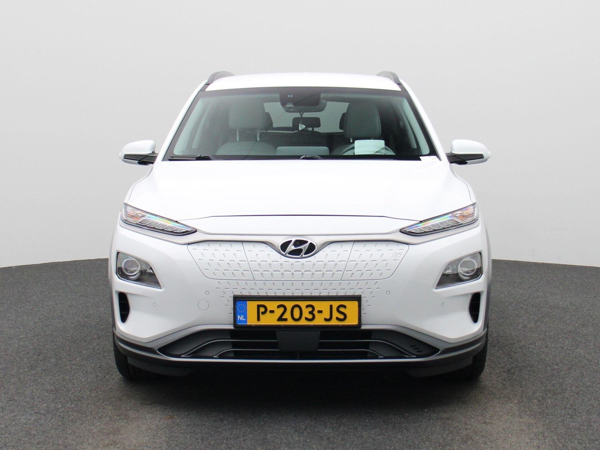 Hyundai Kona EV Fashion 64 kWh | SOH 100% | Apple Carplay /, 12 maanden, Gebruikt, Leder en Stof, Wit