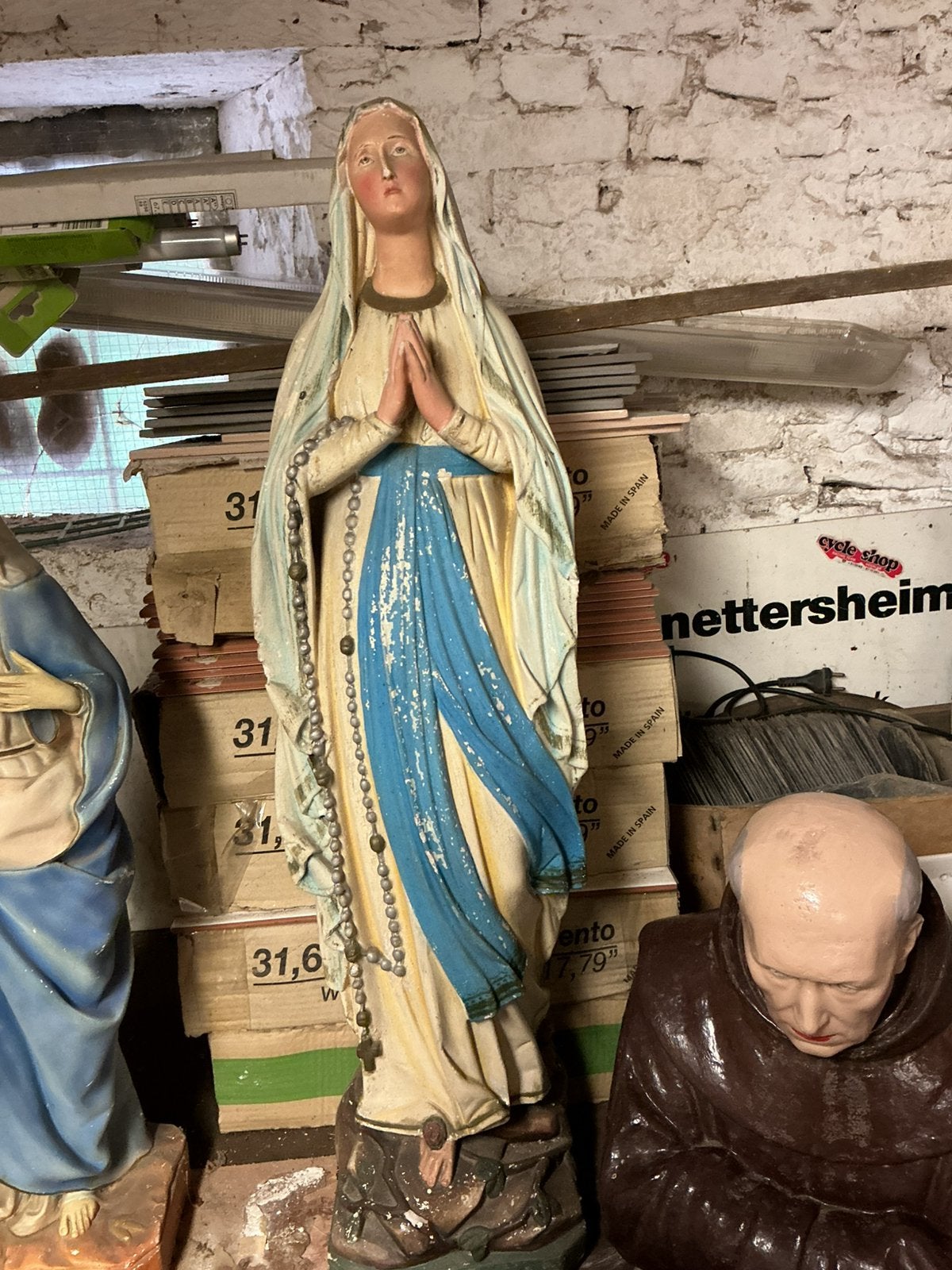 Maria van Lourdes beeld, Ophalen