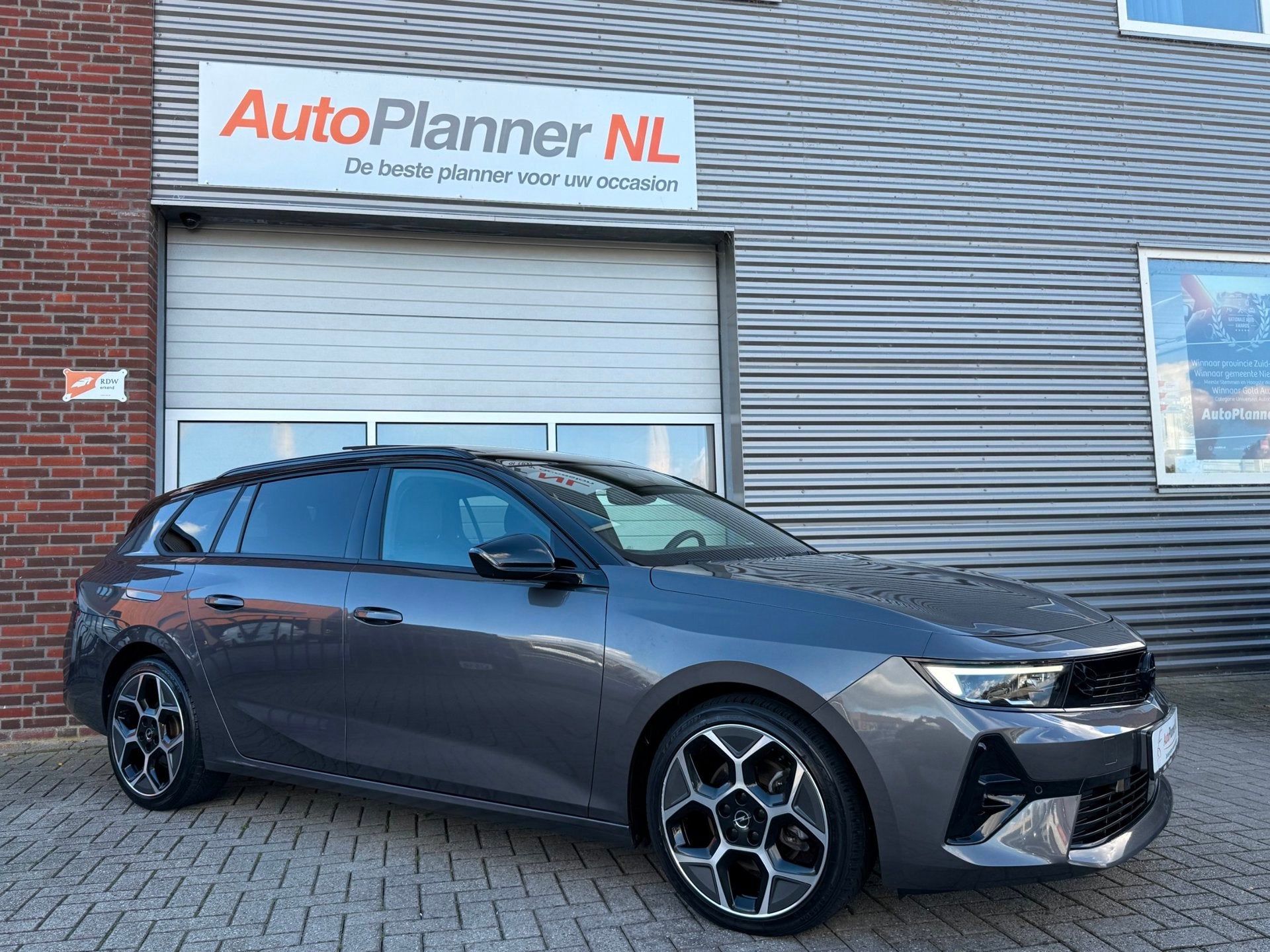 Opel Astra 1.2 Turbo Ultimate! Incl. Btw! 360° Camera! Pano, Dealer onderhouden, Gebruikt, Zwart, 1199 cc